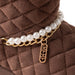 bebe Girls Quilted Cozy Boot with Pearl Chain and Charm