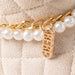 bebe Girls Quilted Cozy Boot with Pearl Chain and Charm