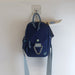 (R)evolution Daily Crossbody